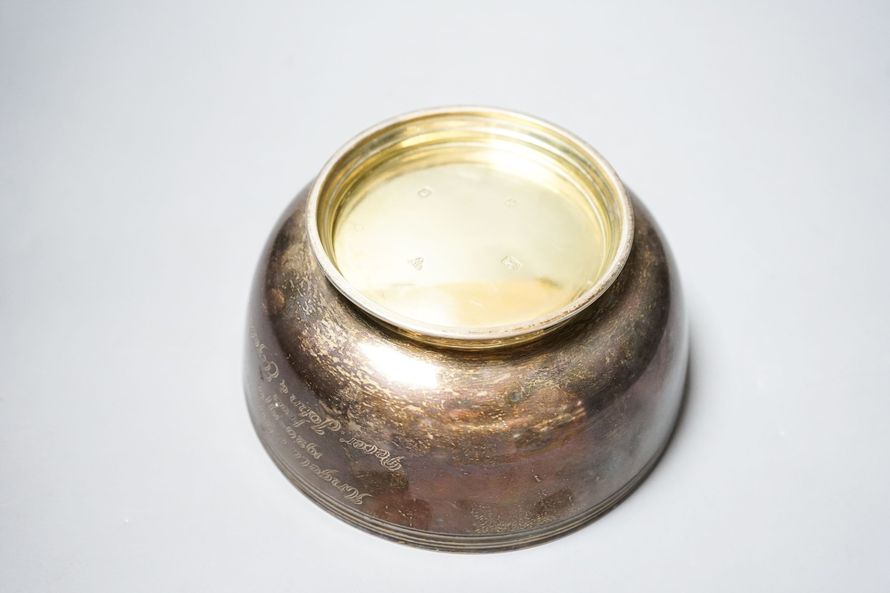 A modern silver circular presentation bowl, Garrard & Co Ltd, London, 1975, diameter 17.5cm, 17.5oz.